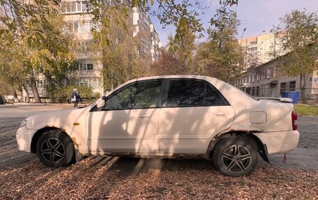 Mazda Familia, 2001 год, 150 000 рублей, 2 фотография