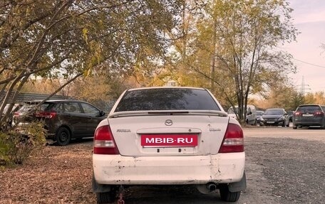 Mazda Familia, 2001 год, 150 000 рублей, 3 фотография