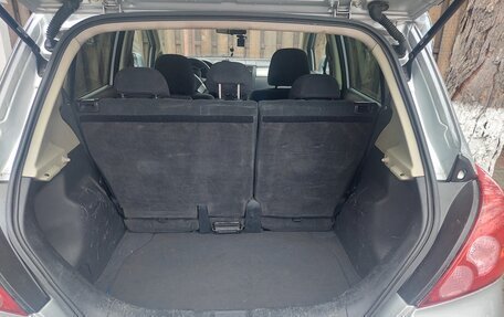 Nissan Tiida, 2010 год, 800 000 рублей, 6 фотография