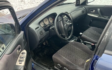 Mazda Protege, 2001 год, 7 фотография