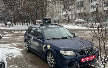 Mazda Protege, 2001 год, 10 фотография