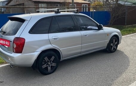 Mazda 323, 2002 год, 300 000 рублей, 7 фотография