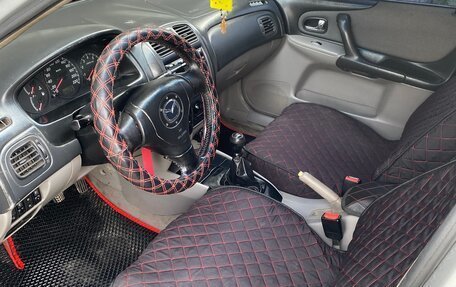 Mazda 323, 2002 год, 300 000 рублей, 8 фотография