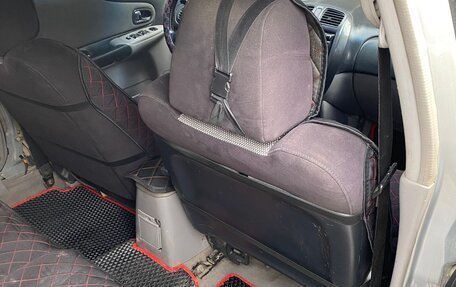 Mazda 323, 2002 год, 300 000 рублей, 9 фотография