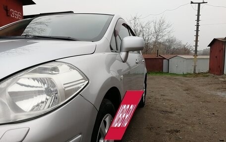 Nissan Tiida, 2010 год, 890 000 рублей, 8 фотография