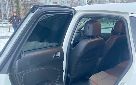 Opel Astra J, 2011 год, 12 фотография