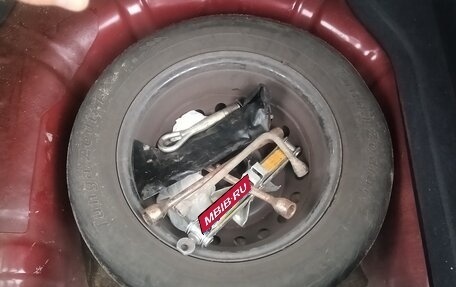 Nissan Tiida, 2010 год, 580 000 рублей, 11 фотография