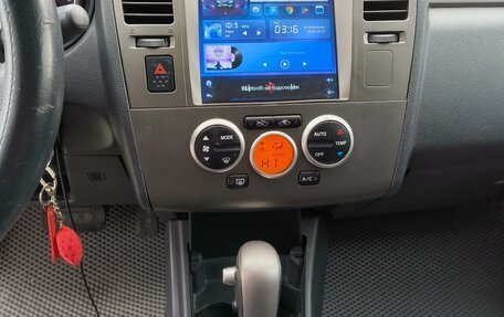 Nissan Tiida, 2010 год, 585 000 рублей, 16 фотография