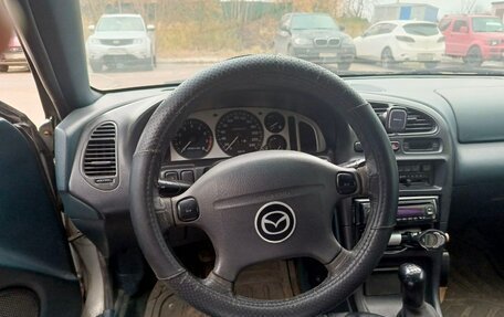 Mazda 323, 1996 год, 140 000 рублей, 6 фотография