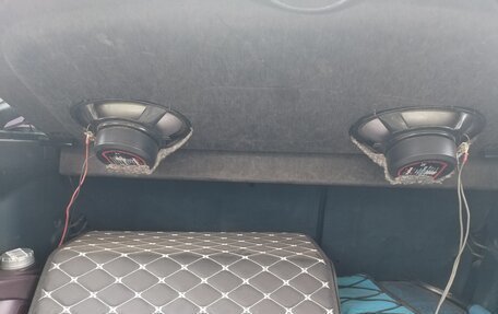 Mazda 323, 1996 год, 140 000 рублей, 12 фотография