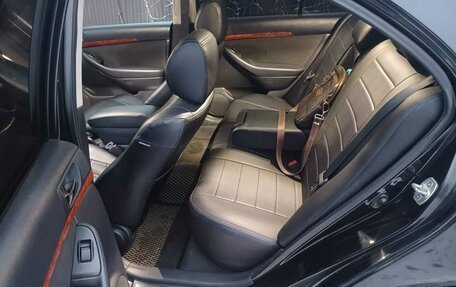 Toyota Avensis III рестайлинг, 2005 год, 750 000 рублей, 17 фотография