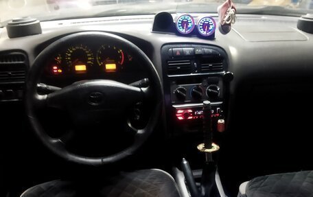 Toyota Avensis III рестайлинг, 1998 год, 300 000 рублей, 8 фотография