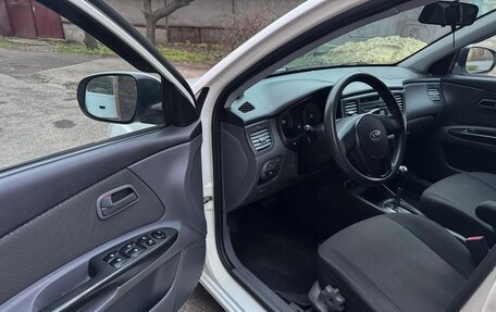 KIA Rio II, 2011 год, 670 000 рублей, 11 фотография