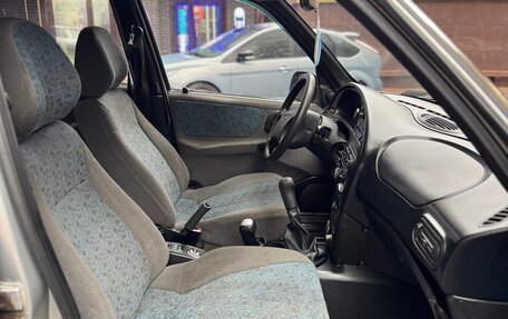 Chevrolet Niva I рестайлинг, 2004 год, 360 000 рублей, 21 фотография