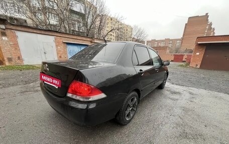 Mitsubishi Lancer IX, 2009 год, 380 000 рублей, 11 фотография