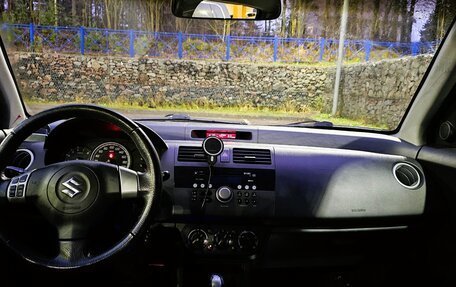 Suzuki Swift III, 2009 год, 800 000 рублей, 11 фотография