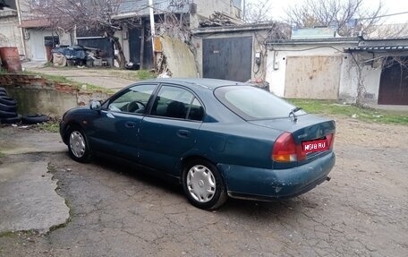 Mitsubishi Carisma I, 1996 год, 185 000 рублей, 1 фотография