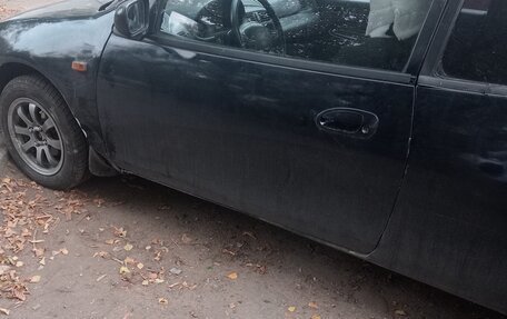 Mazda 323, 1994 год, 200 000 рублей, 3 фотография