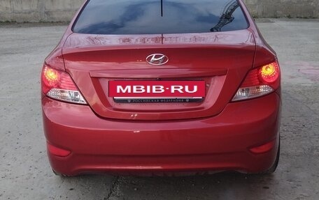 Hyundai Solaris II рестайлинг, 2011 год, 700 000 рублей, 4 фотография