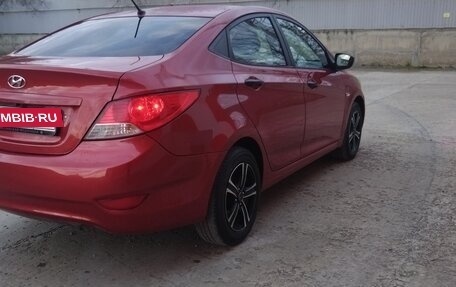 Hyundai Solaris II рестайлинг, 2011 год, 700 000 рублей, 10 фотография