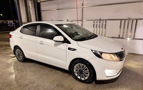 KIA Rio III рестайлинг, 2012 год, 690 000 рублей, 3 фотография