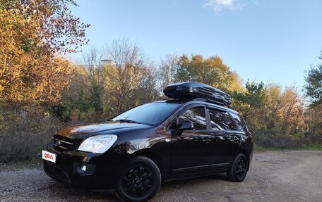 KIA Carens III (RP), 2010 год, 1 135 000 рублей, 2 фотография