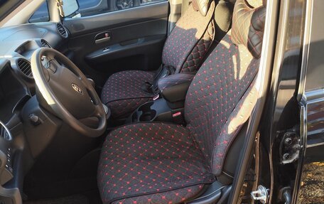 KIA Carens III (RP), 2010 год, 1 135 000 рублей, 14 фотография