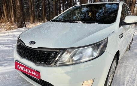 KIA Rio III рестайлинг, 2012 год, 750 000 рублей, 10 фотография