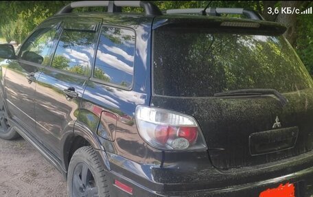 Mitsubishi Outlander III рестайлинг 3, 2004 год, 750 000 рублей, 2 фотография