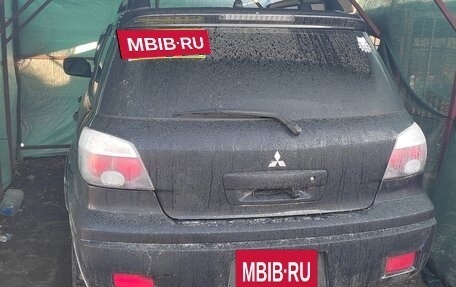 Mitsubishi Outlander III рестайлинг 3, 2004 год, 750 000 рублей, 11 фотография