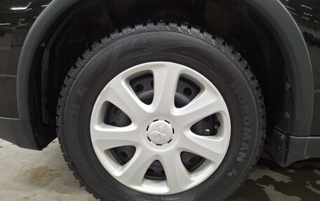 Mitsubishi Outlander III рестайлинг 3, 2014 год, 1 400 000 рублей, 22 фотография