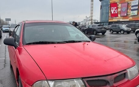 Mitsubishi Carisma I, 1997 год, 150 000 рублей, 1 фотография