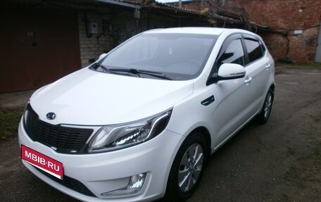KIA Rio III рестайлинг, 2012 год, 910 000 рублей, 1 фотография