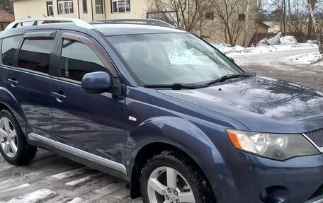 Mitsubishi Outlander III рестайлинг 3, 2007 год, 900 000 рублей, 2 фотография