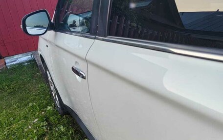 Mitsubishi Outlander III рестайлинг 3, 2013 год, 1 850 000 рублей, 19 фотография