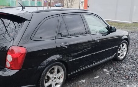 Mazda Protege, 2001 год, 260 000 рублей, 4 фотография