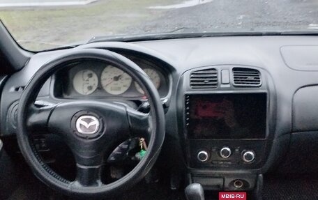 Mazda Protege, 2001 год, 260 000 рублей, 8 фотография