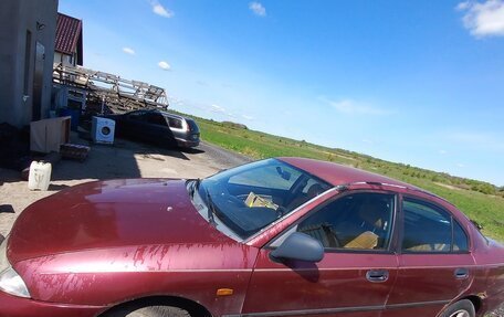 Mitsubishi Carisma I, 1996 год, 120 000 рублей, 4 фотография