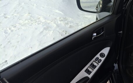 Hyundai Solaris II рестайлинг, 2011 год, 800 000 рублей, 13 фотография