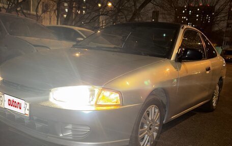 Mitsubishi Mirage VI рестайлинг, 2001 год, 250 000 рублей, 21 фотография