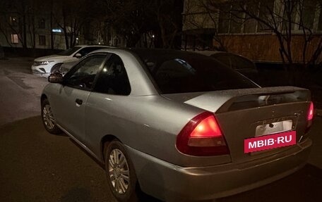 Mitsubishi Mirage VI рестайлинг, 2001 год, 250 000 рублей, 22 фотография