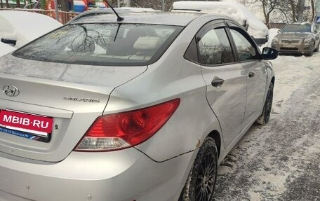 Hyundai Solaris II рестайлинг, 2011 год, 750 000 рублей, 15 фотография