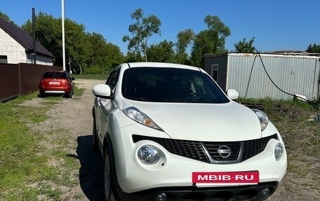 Nissan Juke II, 2013 год, 900 000 рублей, 14 фотография
