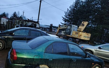 Mitsubishi Mirage VI рестайлинг, 2000 год, 150 000 рублей, 2 фотография