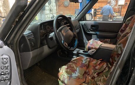 Jeep Cherokee, 1997 год, 1 000 000 рублей, 13 фотография