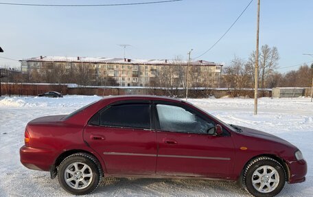 Ford Laser IV, 1994 год, 200 000 рублей, 4 фотография