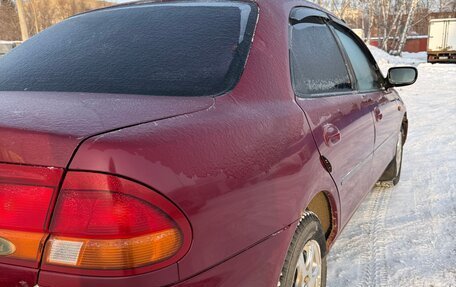 Ford Laser IV, 1994 год, 200 000 рублей, 8 фотография
