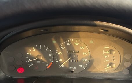 Ford Laser IV, 1994 год, 200 000 рублей, 15 фотография