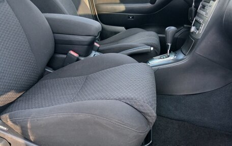 Toyota Avensis III рестайлинг, 2005 год, 780 000 рублей, 23 фотография