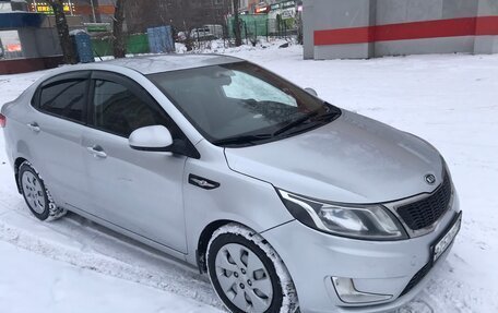 KIA Rio III рестайлинг, 2012 год, 700 000 рублей, 33 фотография